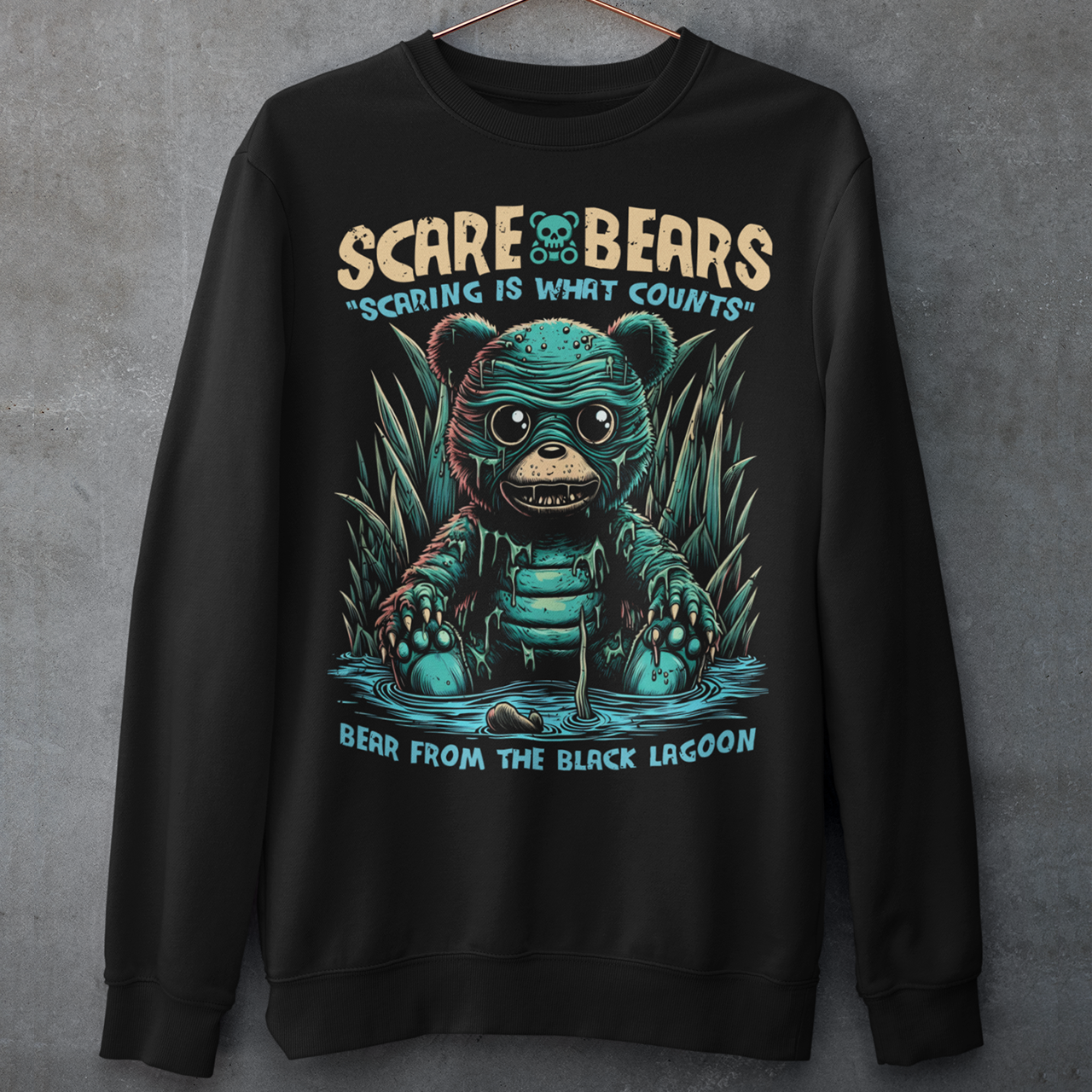 Black sweatshirt of a creature from the black lagoon bear sitting in a swamp with text above "SCARE BEARS". "Text below "BEAR FROM THE BLACK LAGOON".