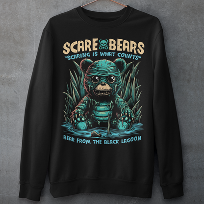 Black sweatshirt of a creature from the black lagoon bear sitting in a swamp with text above "SCARE BEARS". "Text below "BEAR FROM THE BLACK LAGOON".