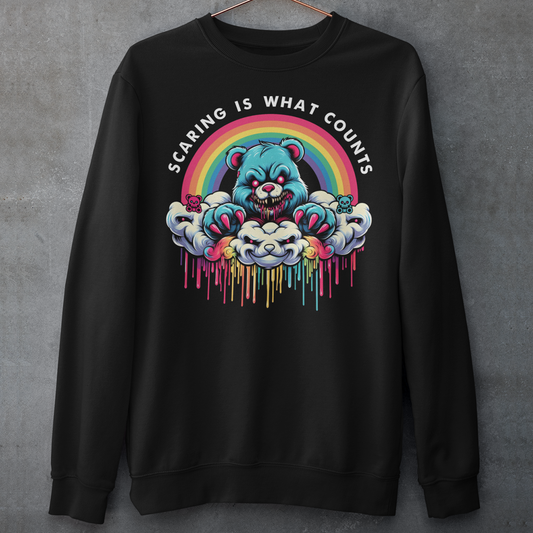 Black sweatshirt of scary bear on a cloud with a rainbow with text above "SCARING IS WHAT COUNTS".