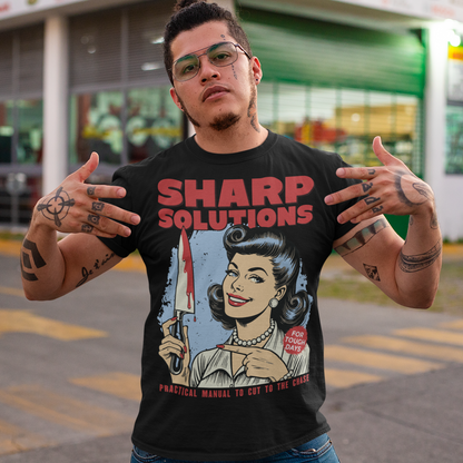 Slice through the stress of everyday life with this bold and cheeky “Sharp Solutions” retro-style T-shirt. Designed in a classic vintage aesthetic, it features a 1950s housewife confidently holding a dripping knife with a charming smile, paired with tongue-in-cheek text that adds the perfect dose of dark humor. Ideal for fans of edgy throwback art, sarcastic designs, and quirky graphic tees, this shirt makes a standout gift and a fun conversation starter wherever you wear it.