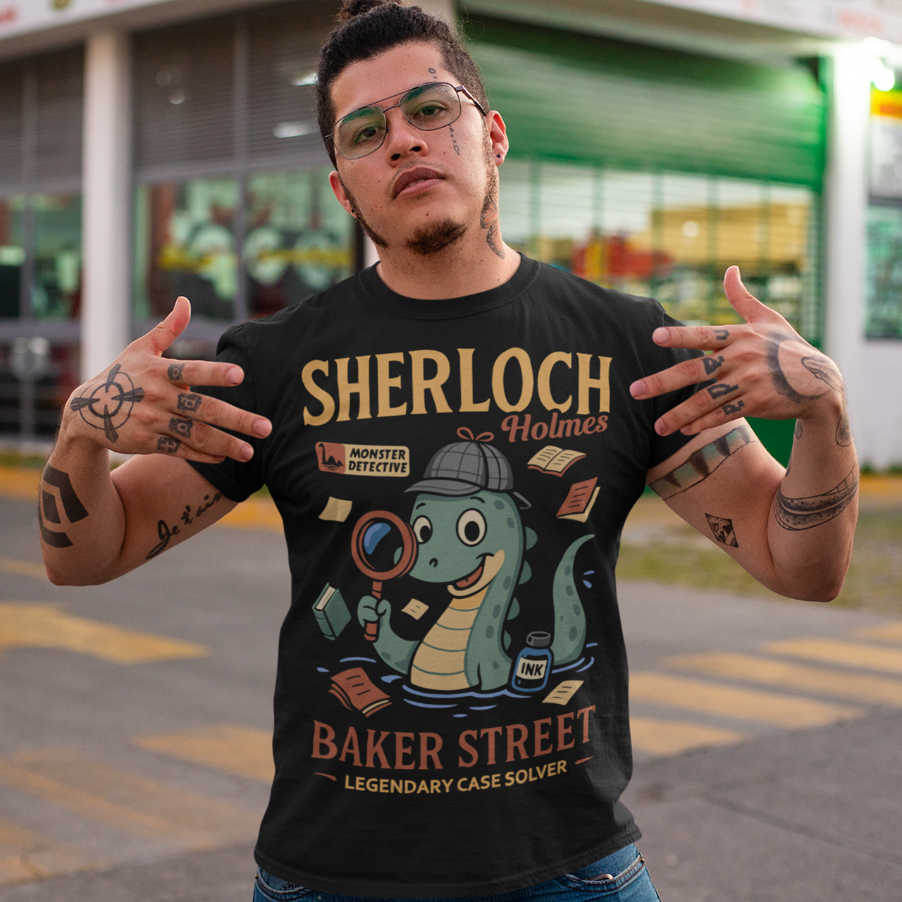 Meet the most curious creature on Baker Street with this fun and clever Sherloch Holmes Monster Detective t-shirt. This playful design reimagines the legendary detective as an adorable little loch ness monster investigator, complete with a classic detective hat, magnifying glass, scattered case notes, and a bottle of ink ready to record the next big mystery. With its charming illustration style and witty wordplay, this shirt blends classic detective fiction with lighthearted monster humor.