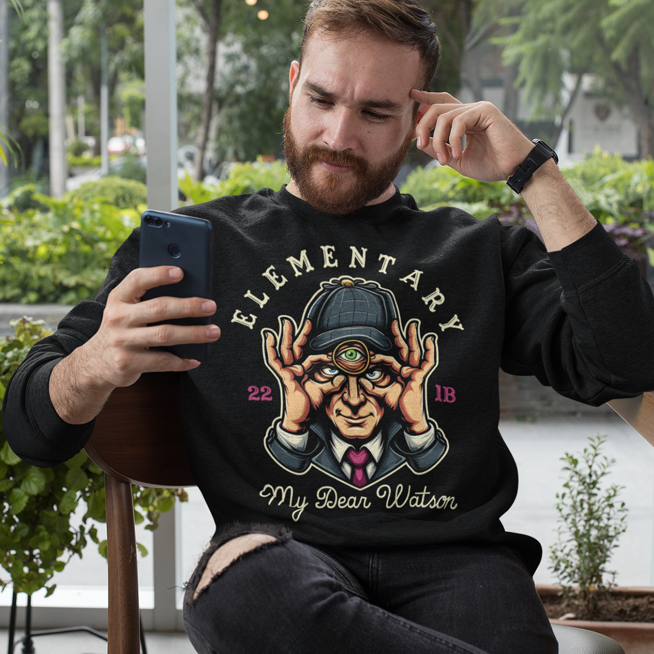 Black sweatshirt of Sherlock Holmes with a third eye and text ELEMENTARY MY DEAR WATSON.