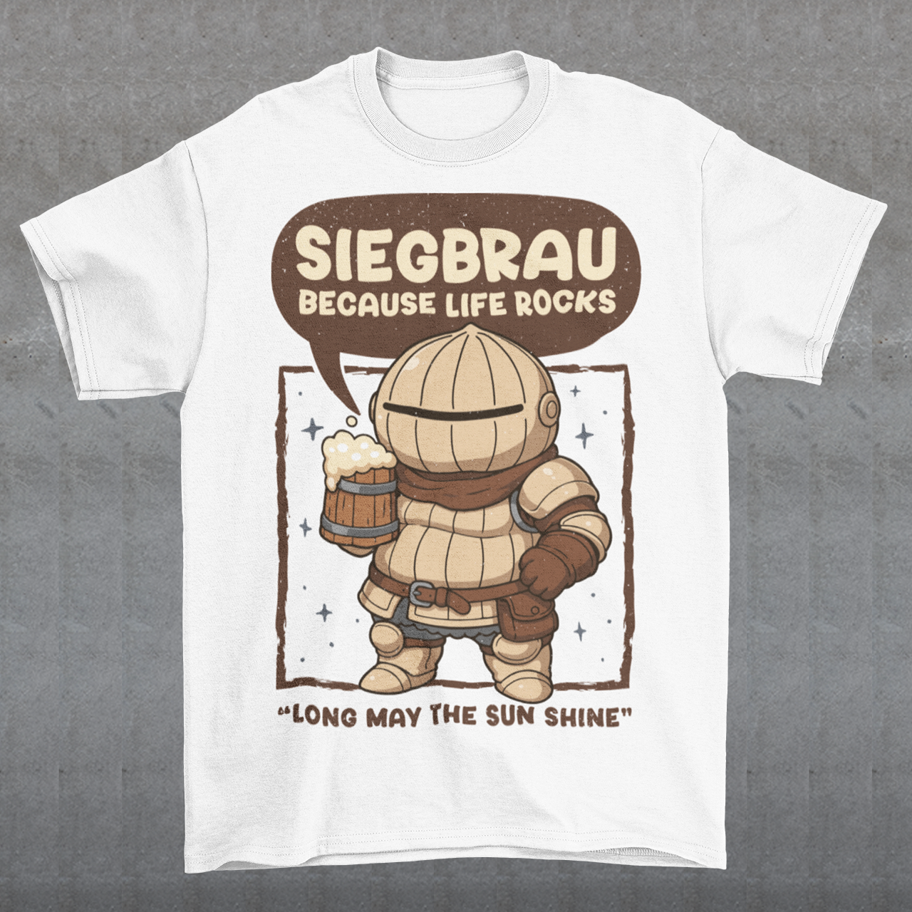 White t-shirt featuring a cute, chibi-style armored knight Siegmeyer of Catarina holding a frothy beer mug. Above the character, bold text reads “Siegbrau because life rocks,” with smaller text below saying “Long may the sun shine.” The design has a playful fantasy theme with soft brown tones and a hand-drawn style, appealing to gamers and fans of medieval or RPG-inspired humor.