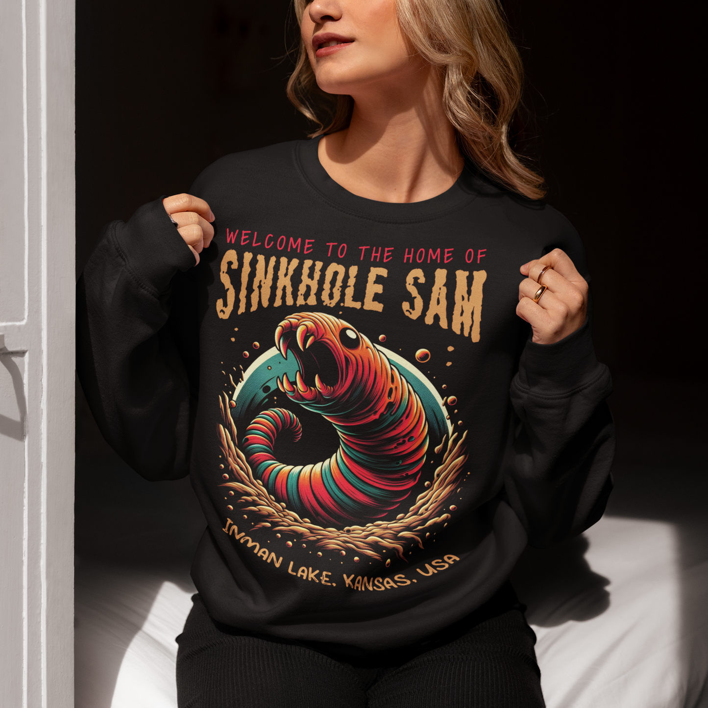 Black sweatshirt of Sinkhole Sam.