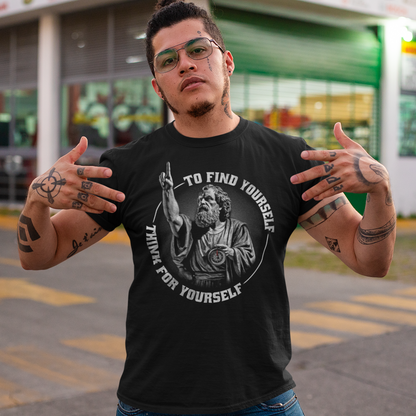 Introducing the "Socratic Wisdom" T-shirt, a thought-provoking blend of philosophy and style that pays homage to the great philosopher Socrates. Picture Socrates in a classic pose, with his finger raised in contemplation and confidently holding a compass, symbolizing his unwavering commitment to intellectual exploration. The design is not just an artistic representation but a visual embodiment of his timeless wisdom.