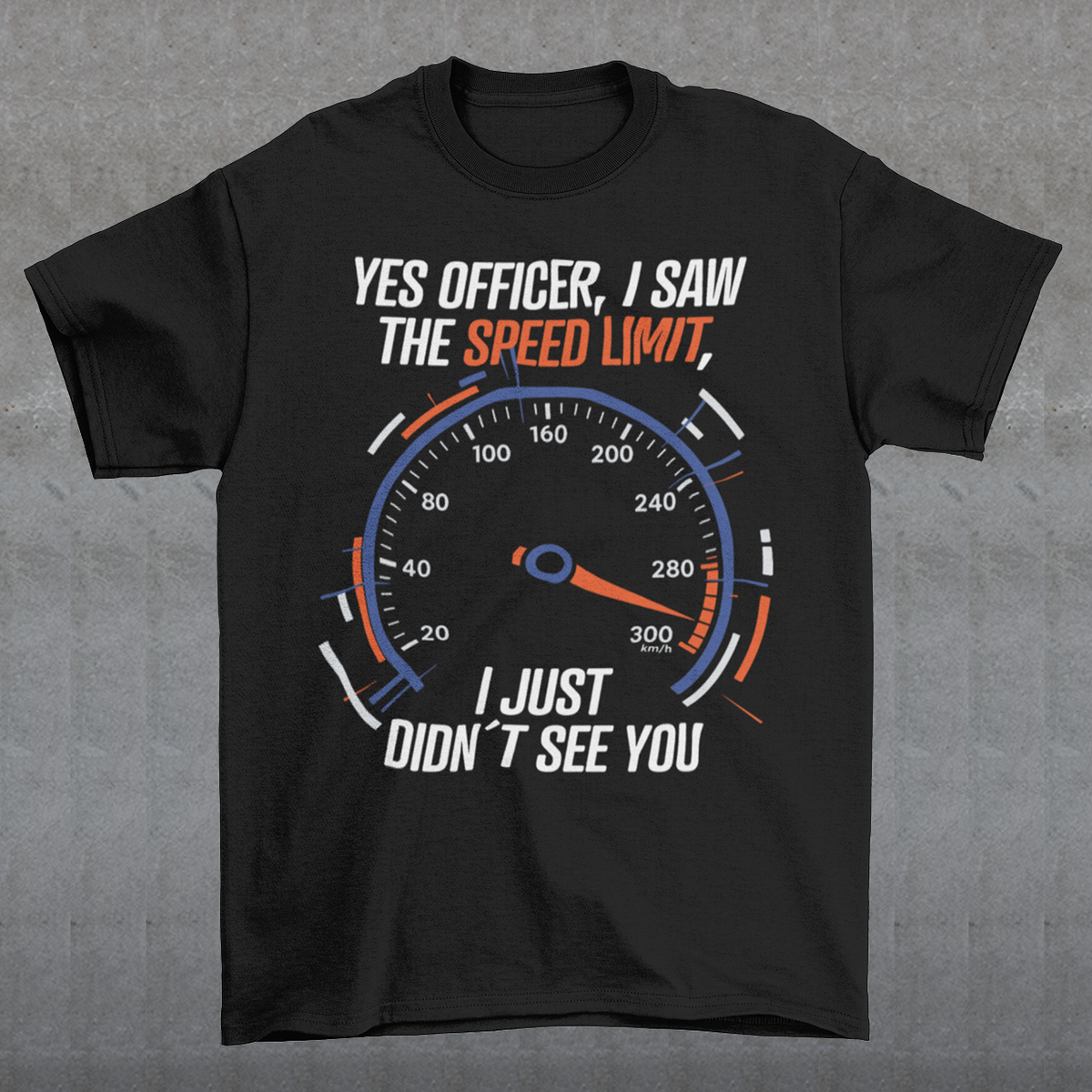 Black t-shirt featuring a bold speedometer graphic with the text “YES OFFICER, I SAW THE SPEED LIMIT, I JUST DIDN’T SEE YOU.” The design uses white, orange, and blue lettering and accents, with a large speed gauge showing speeds up to 300 km/h. Funny driving and car enthusiast themed graphic.
