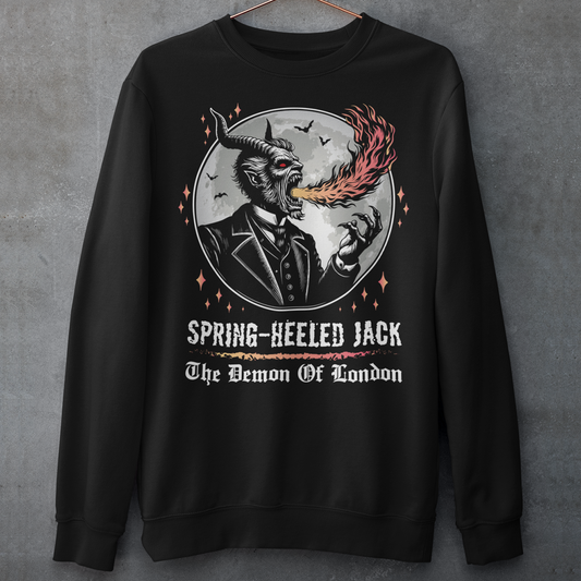 Black sweatshirt of Spring-heeled Jack blowing fire in front of a moon with text underneath SPRING-HEELED JACK THE DEMON OF LONDON.