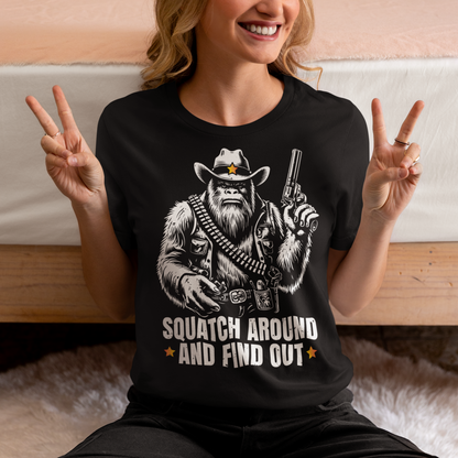 Introducing the "Squatch Around And Find Out" t-shirt, where the legend of the wild west meets the mystery of the elusive Sasquatch! Picture this: a rugged, majestic Sasquatch, decked out in full cowboy gear, complete with a sheriff's badge and a trusty firearm at the ready. With a steely gaze and an air of authority, this Squatch means business. Beneath this formidable figure, the bold text reads: "SQUATCH AROUND AND FIND OUT."