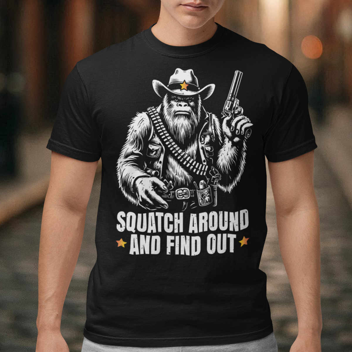 Introducing the "Squatch Around And Find Out" t-shirt, where the legend of the wild west meets the mystery of the elusive Sasquatch! Picture this: a rugged, majestic Sasquatch, decked out in full cowboy gear, complete with a sheriff's badge and a trusty firearm at the ready. With a steely gaze and an air of authority, this Squatch means business. Beneath this formidable figure, the bold text reads: "SQUATCH AROUND AND FIND OUT."
