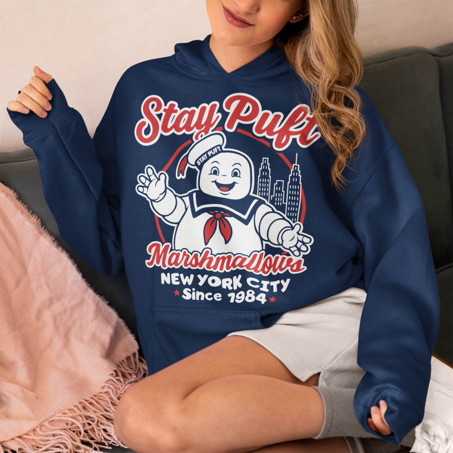 Bring some sweet nostalgia to your wardrobe with this Stay Puft Marshmallows Hoodie! Featuring the iconic Stay Puft Marshmallow Man, this design captures the perfect mix of charm and chaos. The bold text “Stay Puft Marshmallows” adds a vintage, retro-advertisement vibe — just like the classic 80s original.