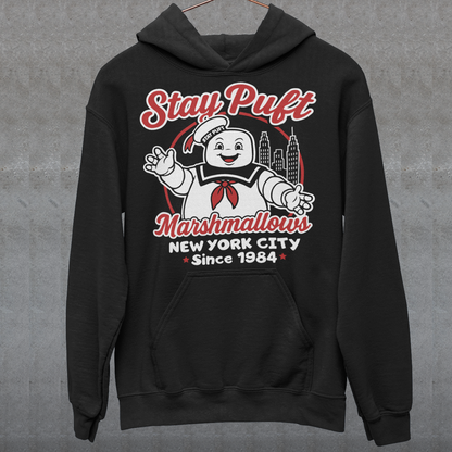 Bring some sweet nostalgia to your wardrobe with this Stay Puft Marshmallows Hoodie! Featuring the iconic Stay Puft Marshmallow Man, this design captures the perfect mix of charm and chaos. The bold text “Stay Puft Marshmallows” adds a vintage, retro-advertisement vibe — just like the classic 80s original.