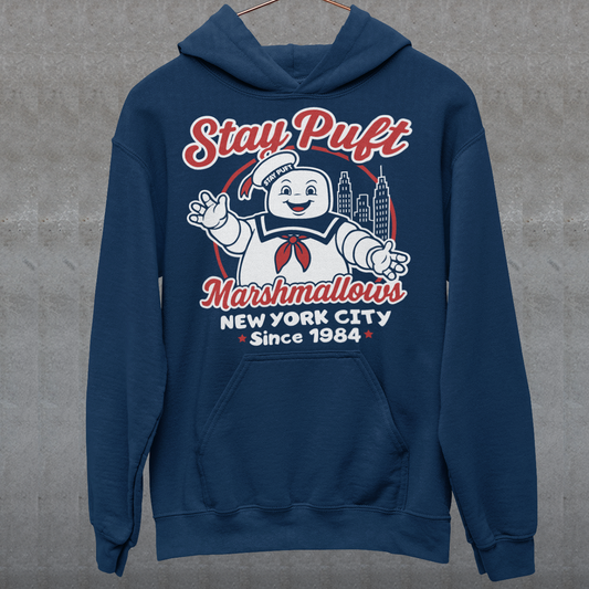 Bring some sweet nostalgia to your wardrobe with this Stay Puft Marshmallows Hoodie! Featuring the iconic Stay Puft Marshmallow Man, this design captures the perfect mix of charm and chaos. The bold text “Stay Puft Marshmallows” adds a vintage, retro-advertisement vibe — just like the classic 80s original.