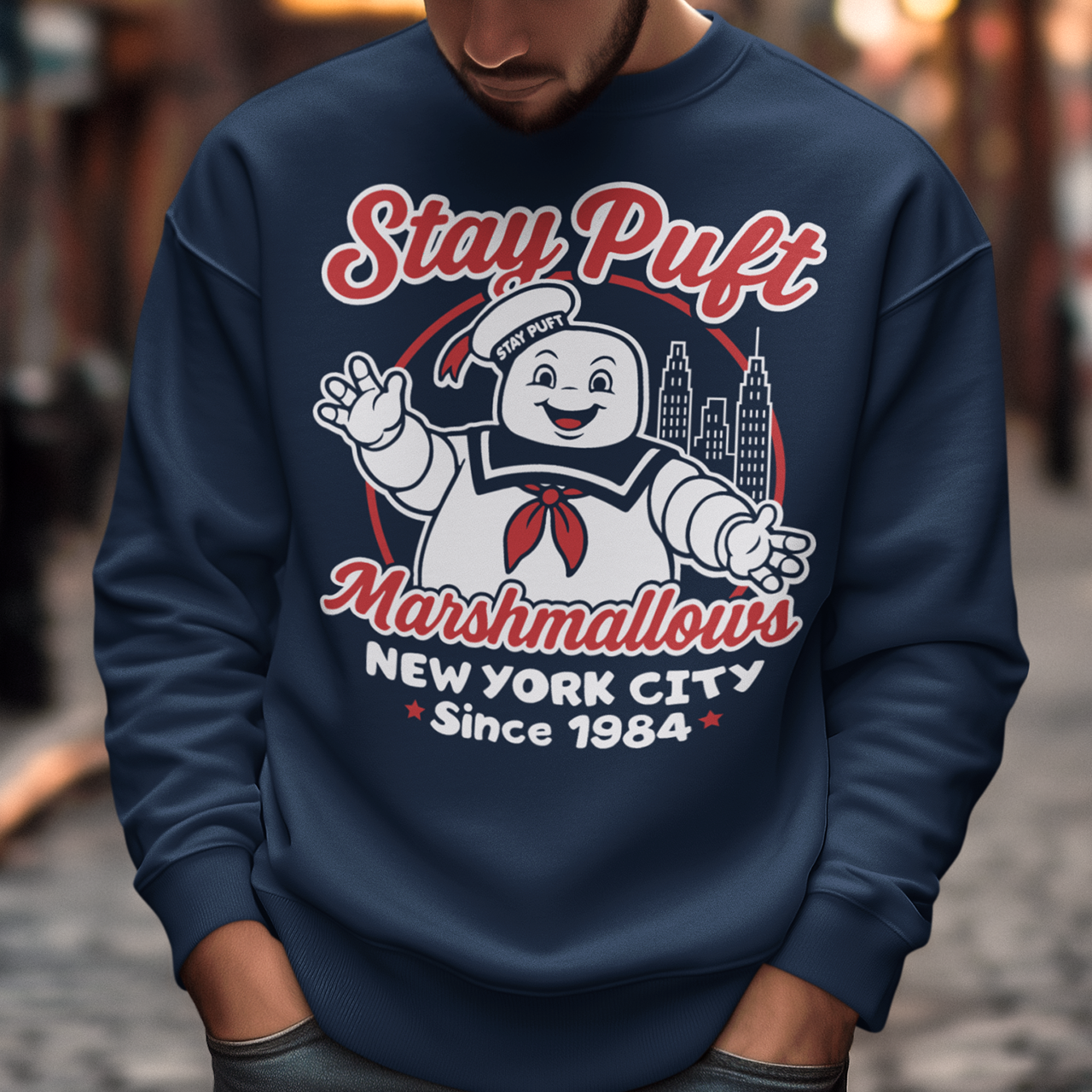 Bring some sweet nostalgia to your wardrobe with this Stay Puft Marshmallows Sweatshirt! Featuring the iconic Stay Puft Marshmallow Man, this design captures the perfect mix of charm and chaos. The bold text “Stay Puft Marshmallows” adds a vintage, retro-advertisement vibe — just like the classic 80s original.