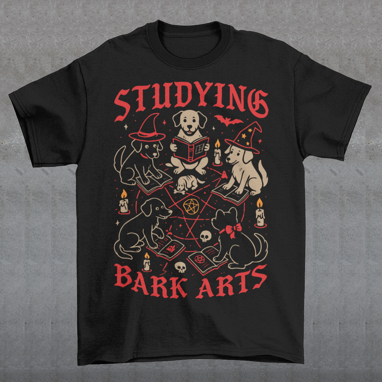 Studying The Bark Arts T-Shirt - Dark Arts Dog Shirt - Dog Lover Tee - Funny Pet Gift. Gather the cutest coven you’ve ever seen with this playful and spooky “Studying Bark Arts” t-shirt. Featuring a circle of adorable pups deep in magical study, this design blends witchy vibes with wholesome dog energy. From tiny spellbooks and glowing candles to pentagrams and wizard hats, every detail adds a charming twist to classic occult imagery, turning dark arts into pure, tail-wagging fun.