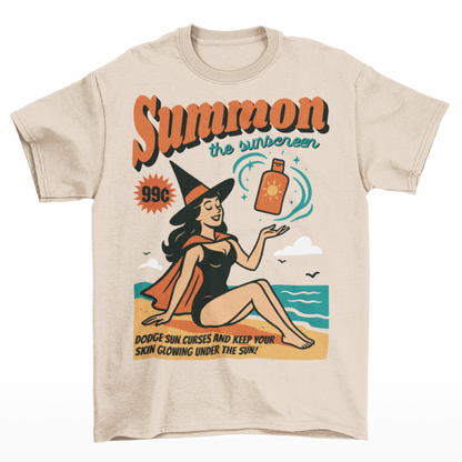 Bring a little magic to your summer with this whimsical tee! Featuring a playful illustration of a witch lounging on the shore, sunhat tilted and a bottle of sunscreen within arm’s reach, this design blends spooky charm with sunny vibes. Bold text above reads SUMMON THE SUNSCREEN in an enchanting font, making it perfect for anyone who loves both moonlit rituals and seaside relaxation.