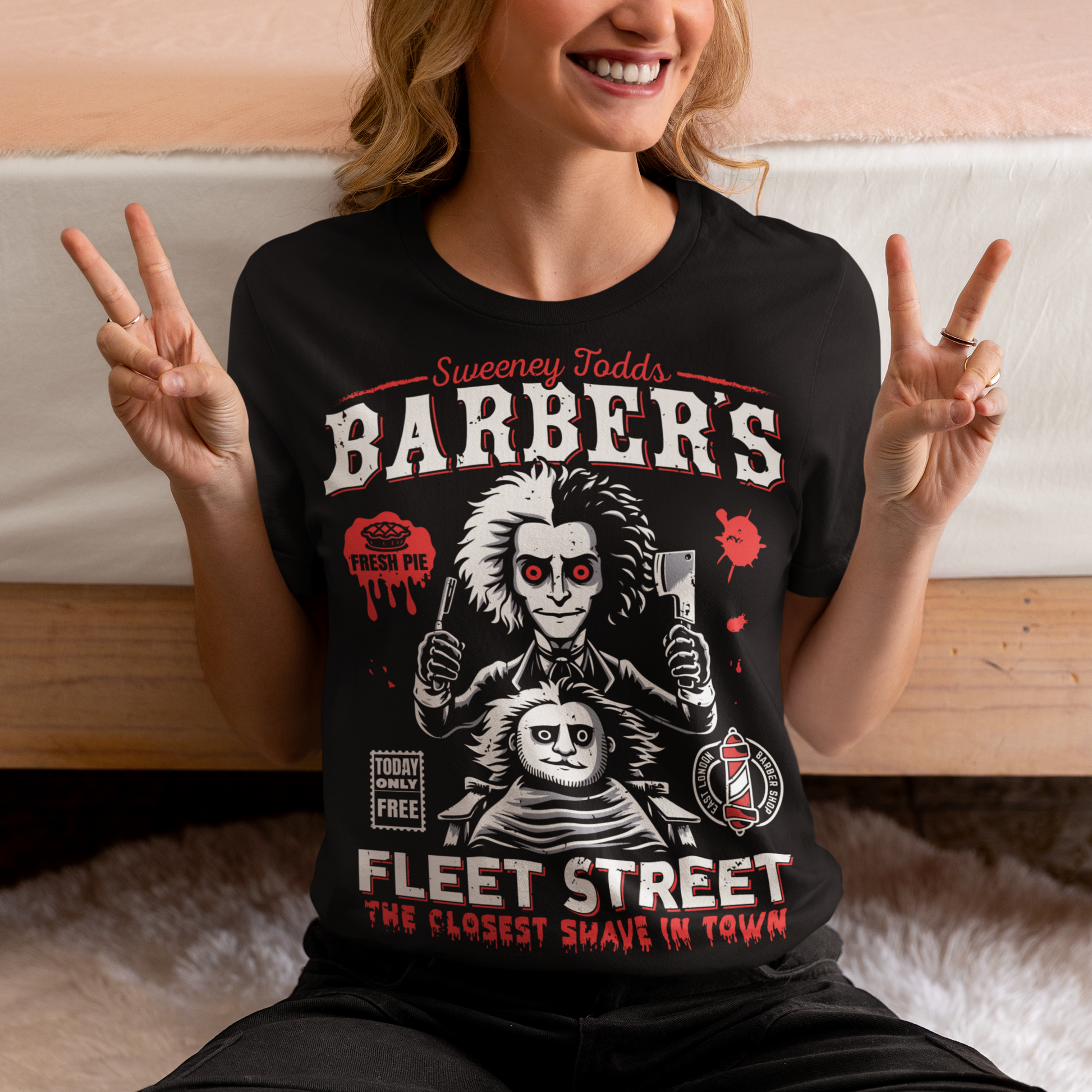 This bold shirt pays tribute to Sweeney Todd’s Barber Shop, the infamous haunt of Fleet Street. The shirt captures the eerie charm of the Demon Barber himself. Perfect for theatre fans, horror enthusiasts, or anyone with a taste for the macabre, this shirt is equal parts stylish and sinister.