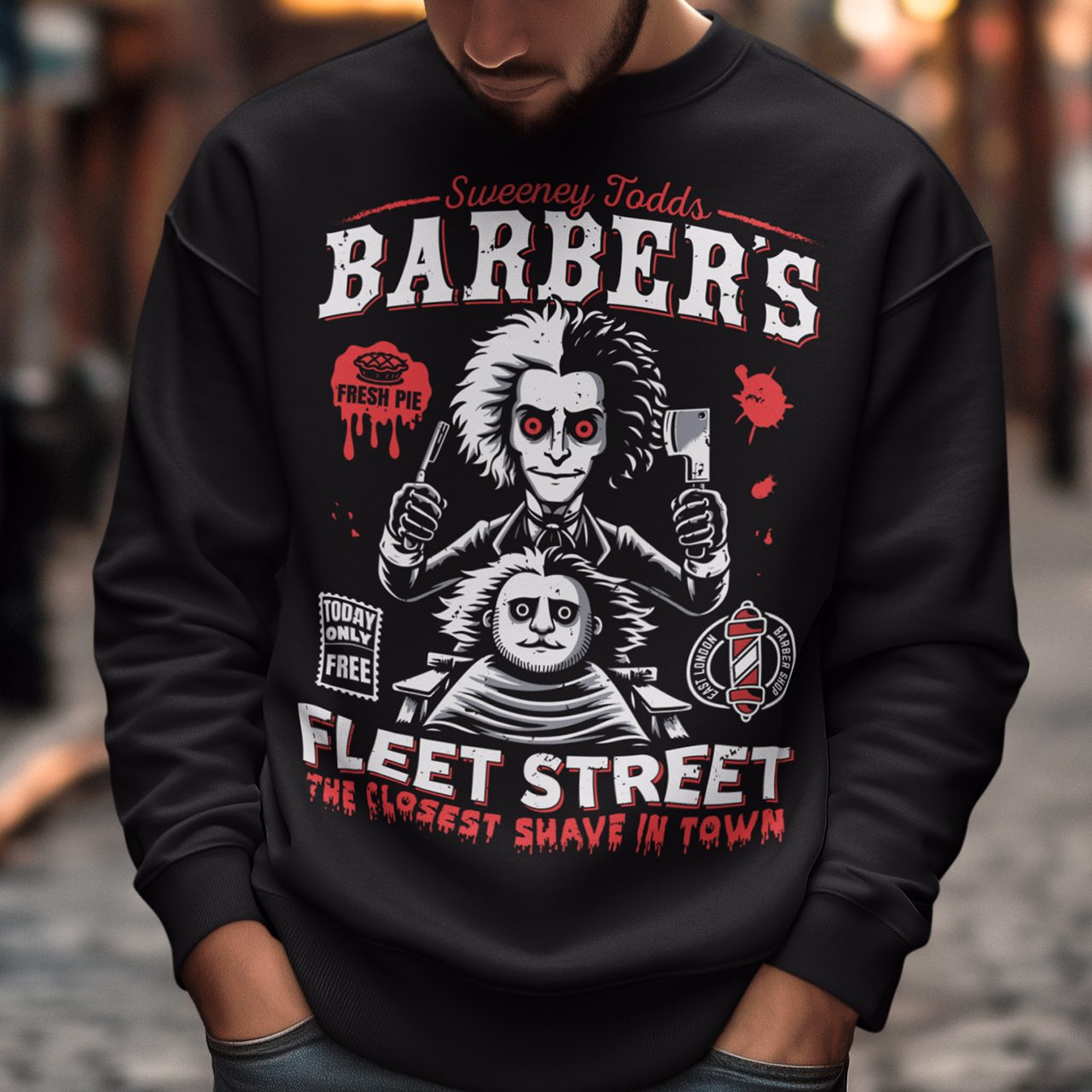This bold shirt pays tribute to Sweeney Todd’s Barber Shop, the infamous haunt of Fleet Street. The shirt captures the eerie charm of the Demon Barber himself. Perfect for theatre fans, horror enthusiasts, or anyone with a taste for the macabre, this shirt is equal parts stylish and sinister.