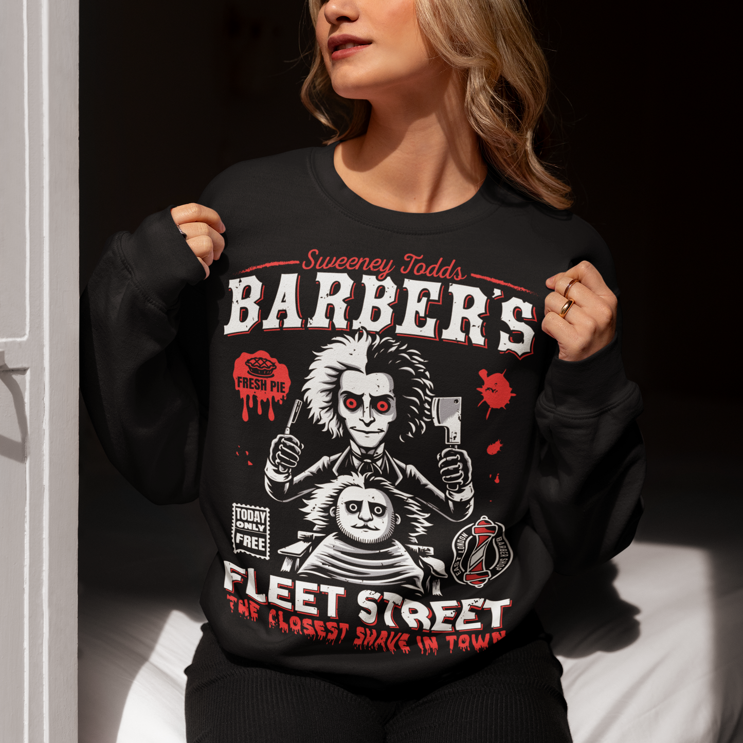 This bold shirt pays tribute to Sweeney Todd’s Barber Shop, the infamous haunt of Fleet Street. The shirt captures the eerie charm of the Demon Barber himself. Perfect for theatre fans, horror enthusiasts, or anyone with a taste for the macabre, this shirt is equal parts stylish and sinister.