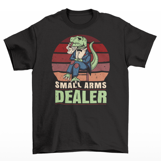 Black t-shirt of a mafia T-Rex in a suit sitting on a chair with a retro sun background with text underneath "SMALL ARMS DEALER".