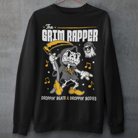 Introducing our electrifying "The Grim Rapper" Sweatshirt – a fusion of humor, music, and the afterlife that will make heads turn and beats drop! This exclusive design features a lively cartoon rendition of the Grim Reaper, decked out in rap gear confidently dropping rhymes. Surrounding the Grim Rapper are playful musical notes that dance in harmony with the rhythm. Above the charismatic cartoon character, bold text proudly declares, "THE GRIM RAPPER."