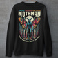 Black sweatshirt of Mothman in a forest with text above THE MAN THE MOTH THE LEGEND MOTHMAN.