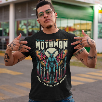 Introducing our exclusive Mothman t-shirt, perfect for fans of cryptid lore and mysterious legends! This shirt features a striking design of the legendary Mothman lurking in a dense, moonlit forest. His glowing red eyes peer through the trees, capturing the eerie essence of the famed creature. Above the haunting image, bold text declares: "THE MAN THE MOTH THE LEGEND MOTHMAN," paying homage to the enigmatic figure who has intrigued generations.