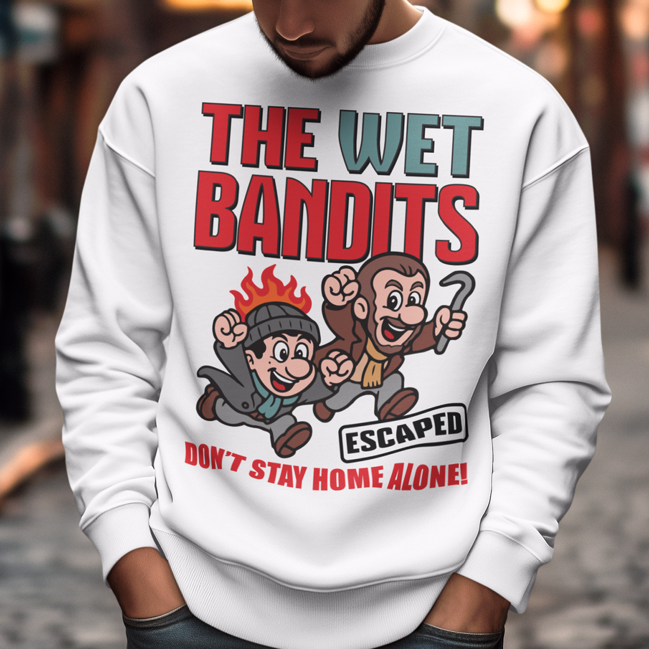 Bring some nostalgic mischief to your wardrobe with this “The Wet Bandits – Don’t Stay Home Alone!” sweatshirt! Inspired by the classic holiday comedy, this fun retro-style design features a cartoon version of the iconic burglar duo in bold, vintage colors. Perfect for fans of 90s movies, Christmas classics, and throwback humor, this shirt blends playful artwork with cozy comfort.