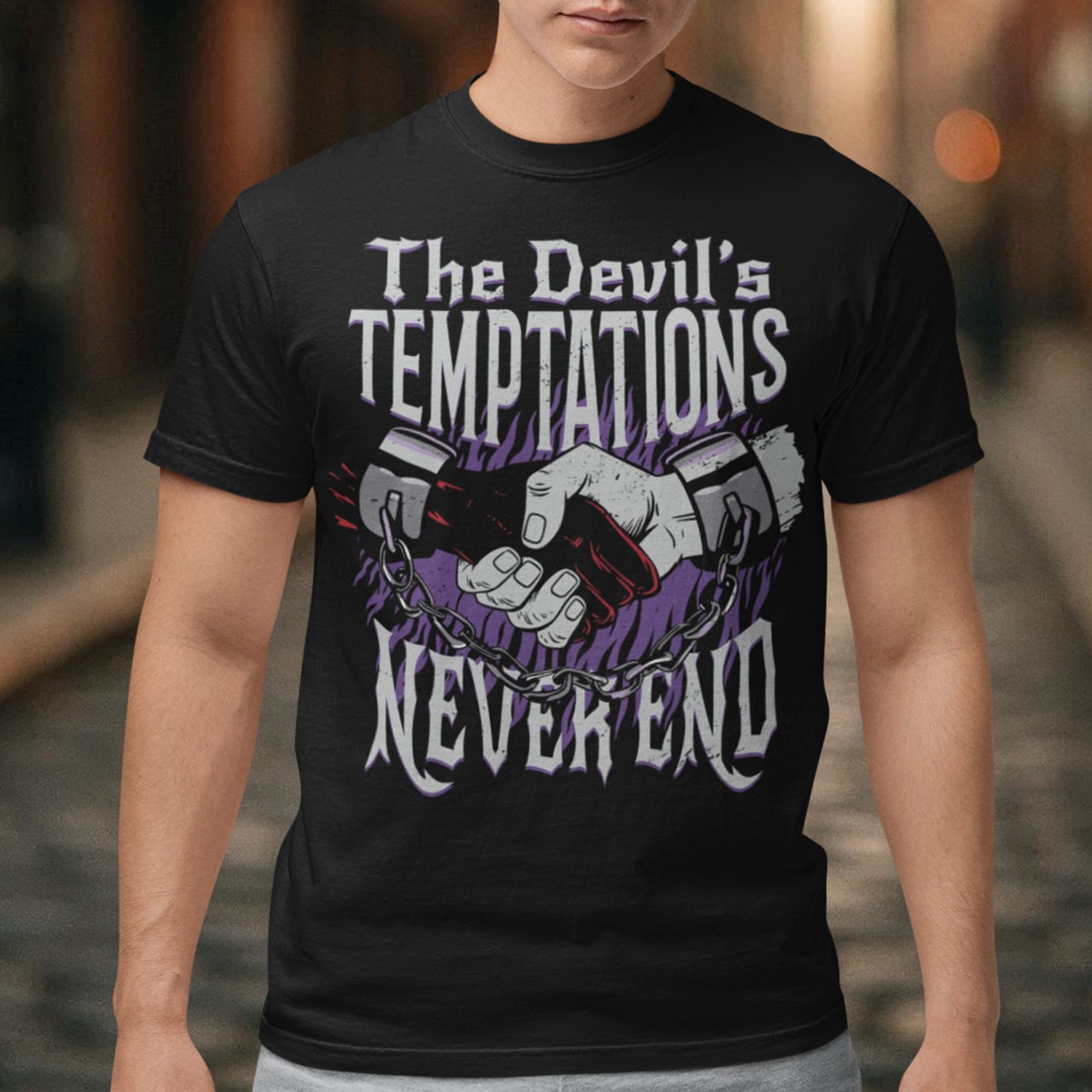 Introducing our captivating and thought-provoking t-shirt design, where symbolism and bold imagery converge to convey a powerful message. Embrace the allure of the mysterious with our "The Devil's Temptations Never End" t-shirt. At the center of this design, you'll find a mesmerizing illustration capturing a gripping moment between a hand and the Devil's hand.