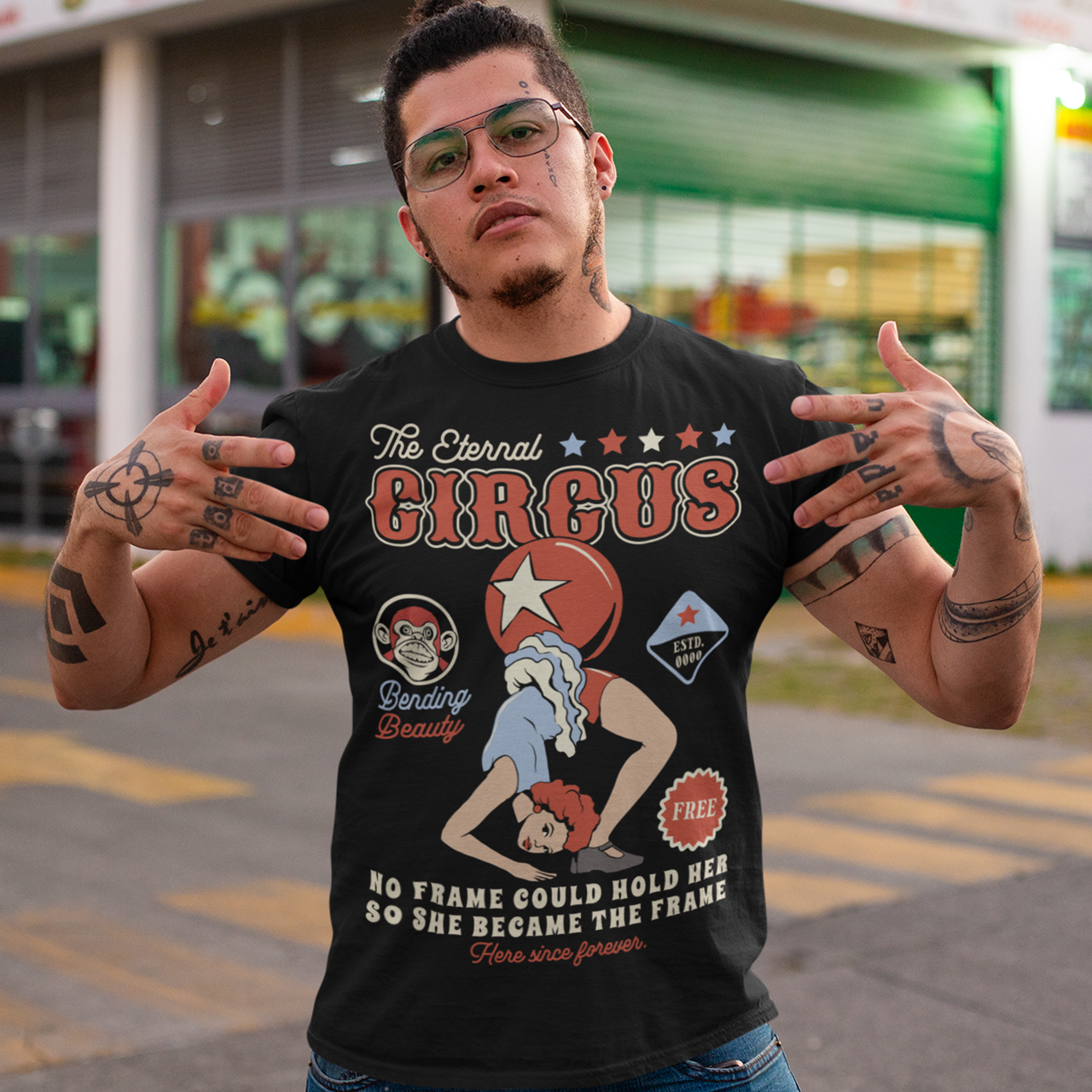 Step into the surreal with our "Contortionist – The Eternal Circus" t-shirt. Featuring a hauntingly elegant contortionist twisted into an impossible pose, this design captures the mystique and wonder of a timeless spectacle. Above the figure, bold vintage lettering proclaims THE ETERNAL CIRCUS — a nod to a show that never ends, where beauty bends and reality blurs.
