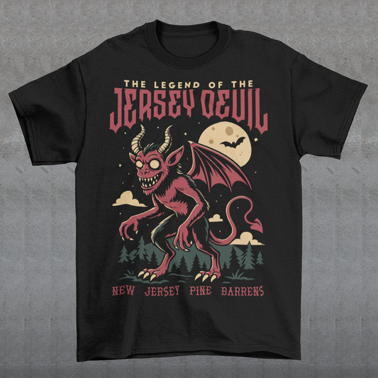 "Embrace the mystery with our Jersey Devil t-shirt! Featuring a striking depiction of the legendary creature , this shirt captures the intrigue and folklore of the New Jersey Pine Barrens. Above, bold letters declare 'THE LEGEND OF THE JERSEY DEVIL,' invoking tales of its enigmatic presence. Below, 'THE NEW JERSEY PINE BARRENS' grounds the design in the eerie beauty of its natural habitat. Wear it to ignite conversations and inspire curiosity about this enduring myth."
