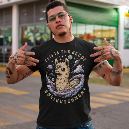 Embrace cosmic wisdom with our captivating Llama t-shirt! Picture this: amidst the vast expanse of space, a serene Llama gazes into the universe, its third eye gleaming with enlightenment. With swirling galaxies as its backdrop, this design captures the essence of transcendence and insight. Around the celestial spectacle, bold text declares, 'THIS IS THE AGE OF ENLIGHTENMENT,' heralding a new era of awareness and understanding.