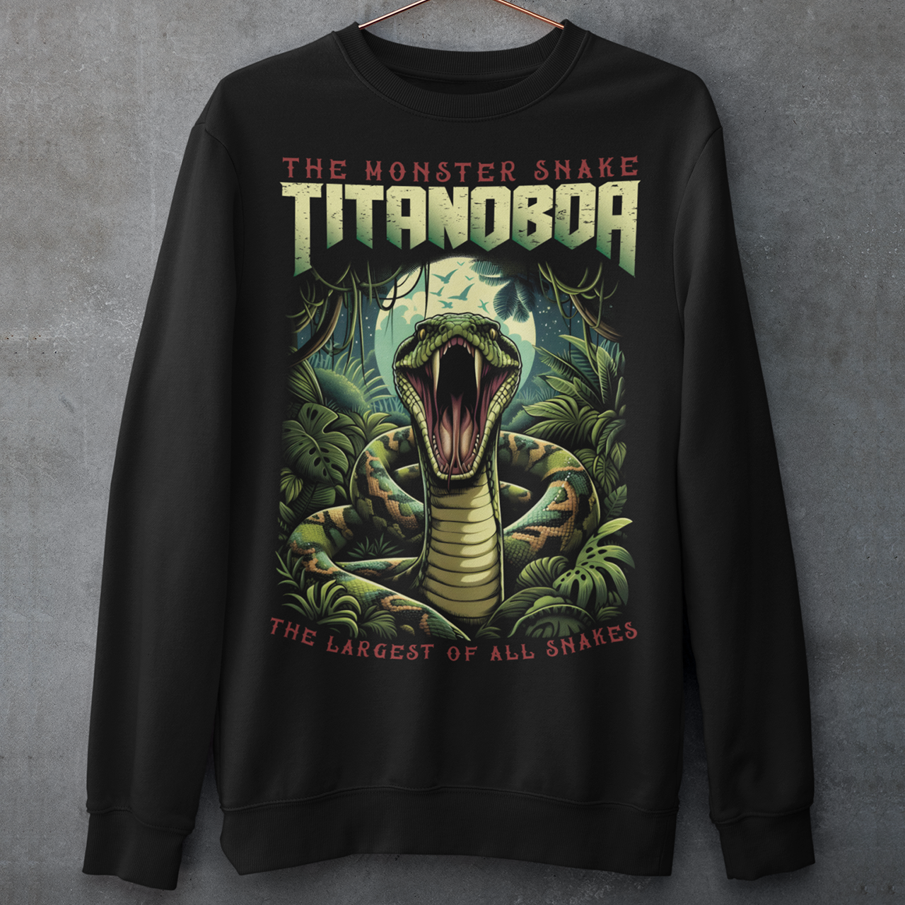 Black sweatshirt of a boa constrictor with text above THE MONSTER SNAKE TITANOBOA.