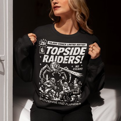 Gear up for an post-apocalyptic showdown with this bold “Topside Raiders” graphic Sweatshirt, inspired by vintage sci-fi comic book covers and Arc Raiders. The design features raiders locked in battle against a towering multi-legged mechanical AI spider, complete with dynamic motion lines, retro typography, and distressed comic-print styling. Perfect for sci-fi fans, comic collectors, gamers, and anyone who loves extraction shooters, this shirt delivers a powerful blend of nostalgia and futuristic action. I