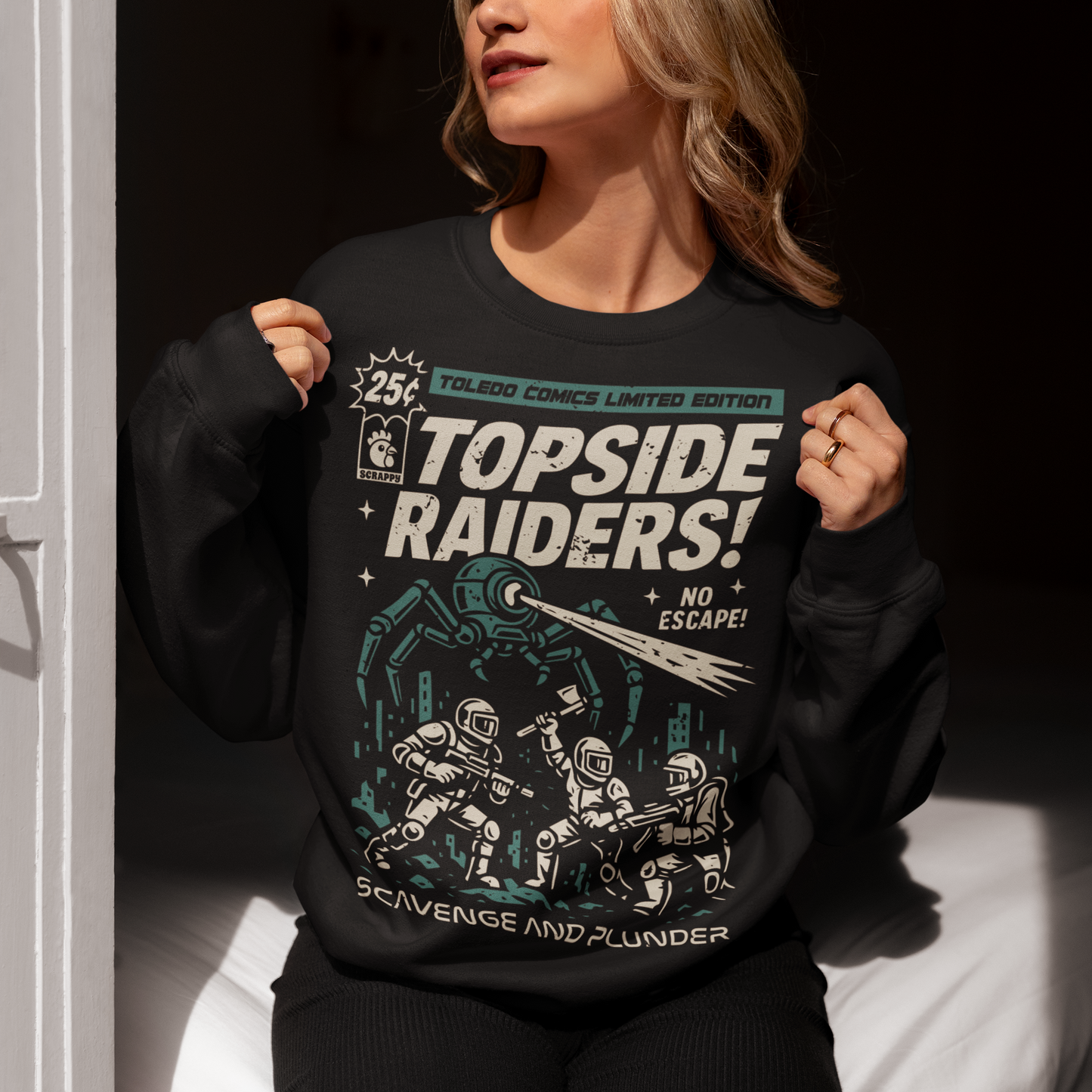Gear up for an post-apocalyptic showdown with this bold “Topside Raiders” graphic Sweatshirt, inspired by vintage sci-fi comic book covers and Arc Raiders. The design features raiders locked in battle against a towering multi-legged mechanical AI spider, complete with dynamic motion lines, retro typography, and distressed comic-print styling. Perfect for sci-fi fans, comic collectors, gamers, and anyone who loves extraction shooters, this shirt delivers a powerful blend of nostalgia and futuristic action. I