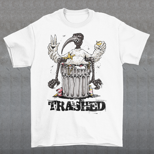 Introducing our latest t-shirt design, featuring a bird lying on a trash can with the text "TRASHED" emblazoned on bottom. This eye-catching design perfectly captures the nonchalant attitude of our feathered friend as it lounges atop a heap of discarded items. Whether you're looking to make a bold statement or simply appreciate the humor in the design, this "TRASHED" t-shirt is sure to turn heads and spark conversations. So why wait? Add it to your wardrobe today and let your style take flight!