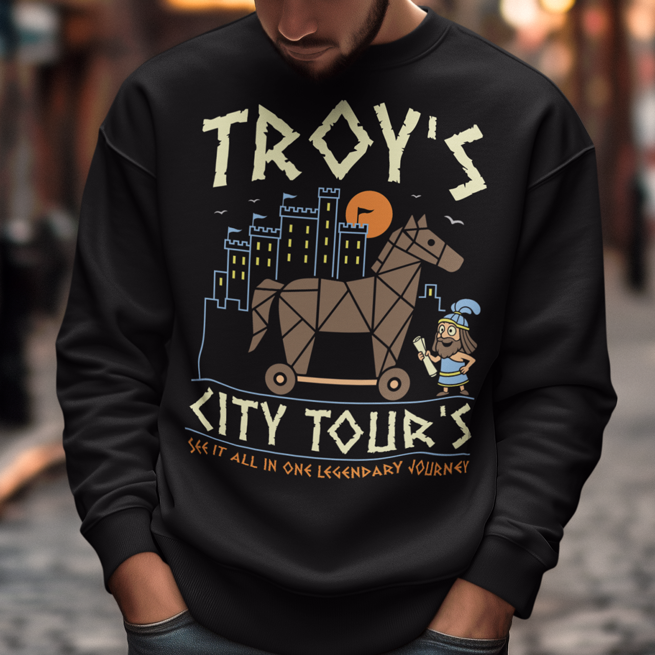 Black sweatshirt featuring a colorful “TROY’S CITY TOURS” graphic with a stylized Trojan horse rolling through an ancient city at sunset. The design includes a small cartoon Trojan warrior and the phrase “SEE IT ALL IN ONE LEGENDARY JOURNEY.” A fun ancient history and Greek mythology themed shirt for history buffs, mythology fans, travelers, and archaeology enthusiasts.