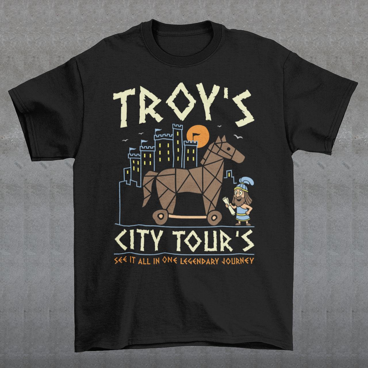 Black t-shirt featuring a colorful “TROY’S CITY TOURS” graphic with a stylized Trojan horse rolling through an ancient city at sunset. The design includes a small cartoon Trojan warrior and the phrase “SEE IT ALL IN ONE LEGENDARY JOURNEY.” A fun ancient history and Greek mythology themed shirt for history buffs, mythology fans, travelers, and archaeology enthusiasts.