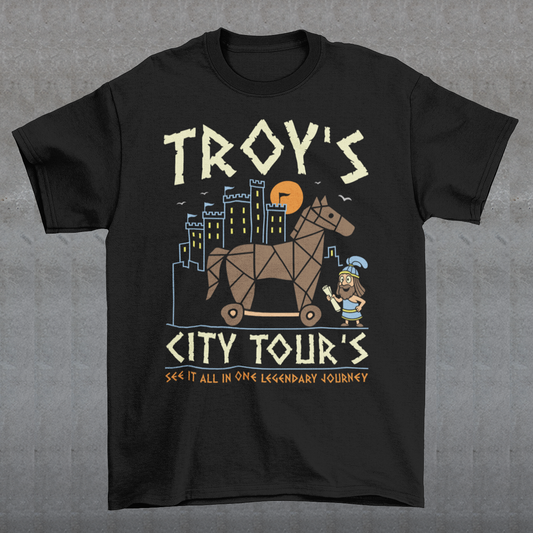 Black t-shirt featuring a colorful “TROY’S CITY TOURS” graphic with a stylized Trojan horse rolling through an ancient city at sunset. The design includes a small cartoon Trojan warrior and the phrase “SEE IT ALL IN ONE LEGENDARY JOURNEY.” A fun ancient history and Greek mythology themed shirt for history buffs, mythology fans, travelers, and archaeology enthusiasts.
