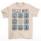 Cream t-shirt of cartoon medieval vegetables in select boxes with text on top VEGGIE WARS and text in the center VEGGIE SELECT.