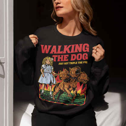 Introducing our newest sweatshirt for all the daring dog walkers out there! If you're brave enough to take on the underworld's fiercest hound, Cerberus, then this shirt is for you. With a bold print of a girl confidently strolling alongside the three-headed beast, our "WALKING THE DOG JUST GOT TRIPLE THE FUN" tee is perfect for anyone who likes to add a bit of excitement to their daily routine.