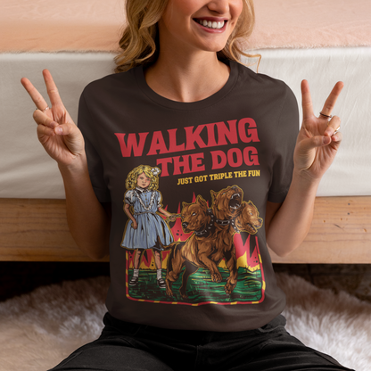 Introducing our newest t-shirt for all the daring dog walkers out there! If you're brave enough to take on the underworld's fiercest hound, Cerberus, then this shirt is for you. With a bold print of a girl confidently strolling alongside the three-headed beast, our "WALKING THE DOG JUST GOT TRIPLE THE FUN" tee is perfect for anyone who likes to add a bit of excitement to their daily routine.