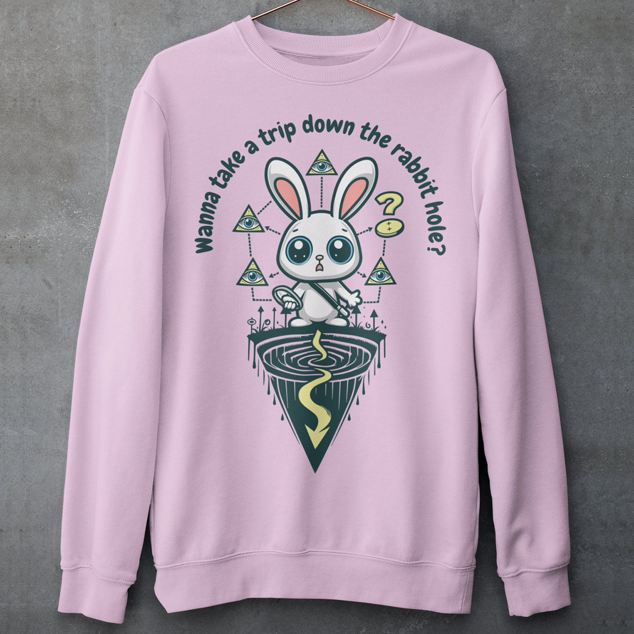 Pink t-shirt of a conspiracy theorist rabbit standing on a rabbit hole with text above WANNA TAKE A TRIP DOWN THE RABBIT HOLE.