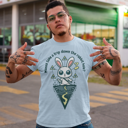 Introducing our one-of-a-kind t-shirt design that's sure to turn heads and spark conversations wherever you go! Picture this: a mysterious rabbit, with an enigmatic glint in its eye, standing poised at the entrance of a deep rabbit hole. Its ears perked up, as if listening for secrets only it knows. Above this captivating scene, bold text reads: "WANNA TAKE A TRIP DOWN THE RABBIT HOLE." Embrace your inner conspiracy theorist and invite others to join you on a journey into the unknown.