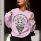 Pink t-shirt of a conspiracy theorist rabbit standing on a rabbit hole with text above WANNA TAKE A TRIP DOWN THE RABBIT HOLE.