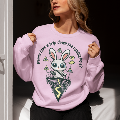 Introducing our one-of-a-kind sweatshirt design that's sure to turn heads and spark conversations wherever you go! Picture this: a mysterious rabbit, with an enigmatic glint in its eye, standing poised at the entrance of a deep rabbit hole. Its ears perked up, as if listening for secrets only it knows. Above this captivating scene, bold text reads: "WANNA TAKE A TRIP DOWN THE RABBIT HOLE." Embrace your inner conspiracy theorist and invite others to join you on a journey into the unknown.
