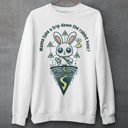 Introducing our one-of-a-kind sweatshirt design that's sure to turn heads and spark conversations wherever you go! Picture this: a mysterious rabbit, with an enigmatic glint in its eye, standing poised at the entrance of a deep rabbit hole. Its ears perked up, as if listening for secrets only it knows. Above this captivating scene, bold text reads: "WANNA TAKE A TRIP DOWN THE RABBIT HOLE." Embrace your inner conspiracy theorist and invite others to join you on a journey into the unknown.