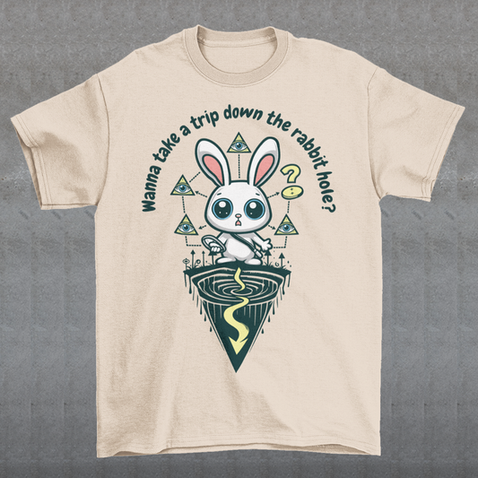 Introducing our one-of-a-kind t-shirt design that's sure to turn heads and spark conversations wherever you go! Picture this: a mysterious rabbit, with an enigmatic glint in its eye, standing poised at the entrance of a deep rabbit hole. Its ears perked up, as if listening for secrets only it knows. Above this captivating scene, bold text reads: "WANNA TAKE A TRIP DOWN THE RABBIT HOLE." Embrace your inner conspiracy theorist and invite others to join you on a journey into the unknown.