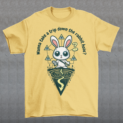 Introducing our one-of-a-kind t-shirt design that's sure to turn heads and spark conversations wherever you go! Picture this: a mysterious rabbit, with an enigmatic glint in its eye, standing poised at the entrance of a deep rabbit hole. Its ears perked up, as if listening for secrets only it knows. Above this captivating scene, bold text reads: "WANNA TAKE A TRIP DOWN THE RABBIT HOLE." Embrace your inner conspiracy theorist and invite others to join you on a journey into the unknown.