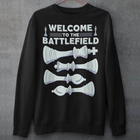 Step onto the board in style with this striking chess-themed t-shirt. Featuring four chess pieces boldly lined up across the chest, this design captures the power and elegance of the game. Above them, the phrase "WELCOME TO THE BATTLEFIELD" commands attention, setting the tone for every strategic thinker and competitor. Whether you're a seasoned grandmaster or just love the game, this shirt is your perfect uniform for everyday victories.