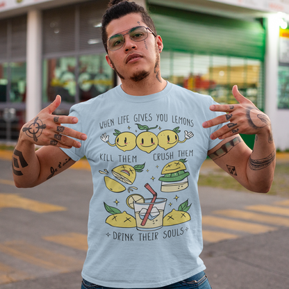 Introducing our adorable and quirky Lemonade-themed t-shirt that is sure to turn heads and bring a smile to your face! This shirt features a delightful design showcasing cute lemons being transformed into delicious lemonade, accompanied by the bold, tongue-in-cheek text: "WHEN LIFE GIVES YOU LEMONS, KILL THEM, CRUSH THEM AND DRINK THEIR SOULS."